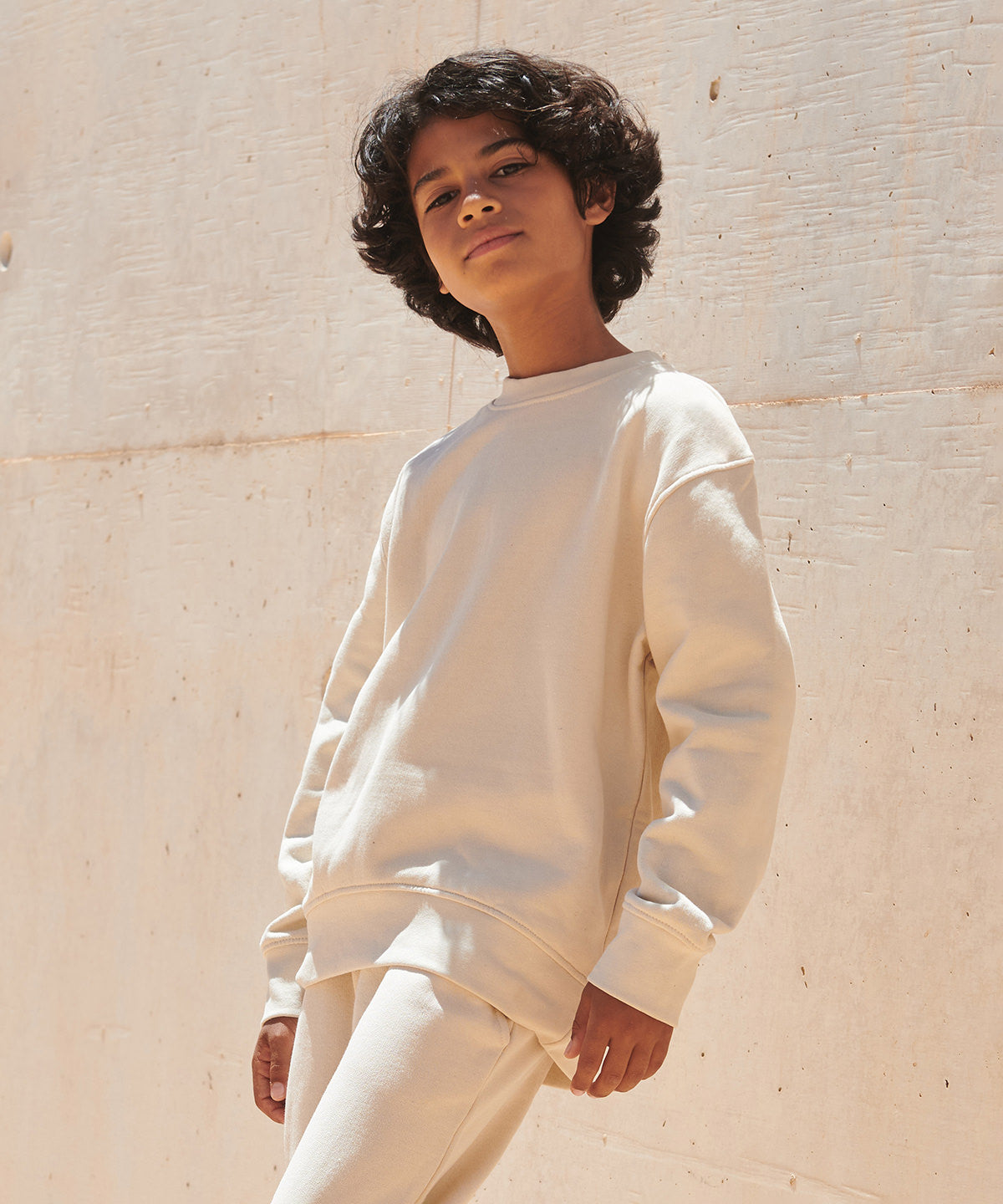 Kids sustainable fashion curved hem sweatshirt